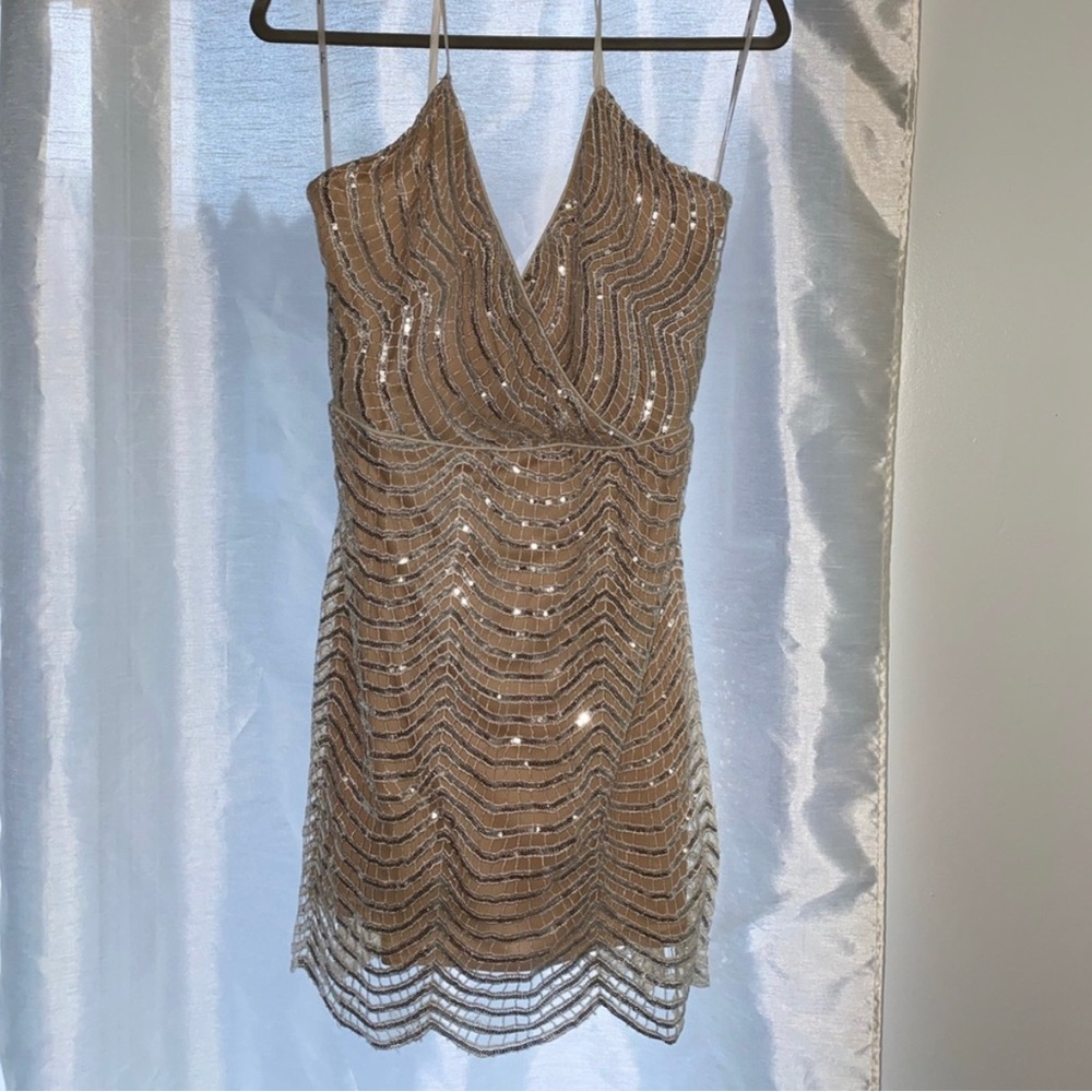 NWT Lulus Silver Sequin Mini dress 
Perfect for a bachelorette!